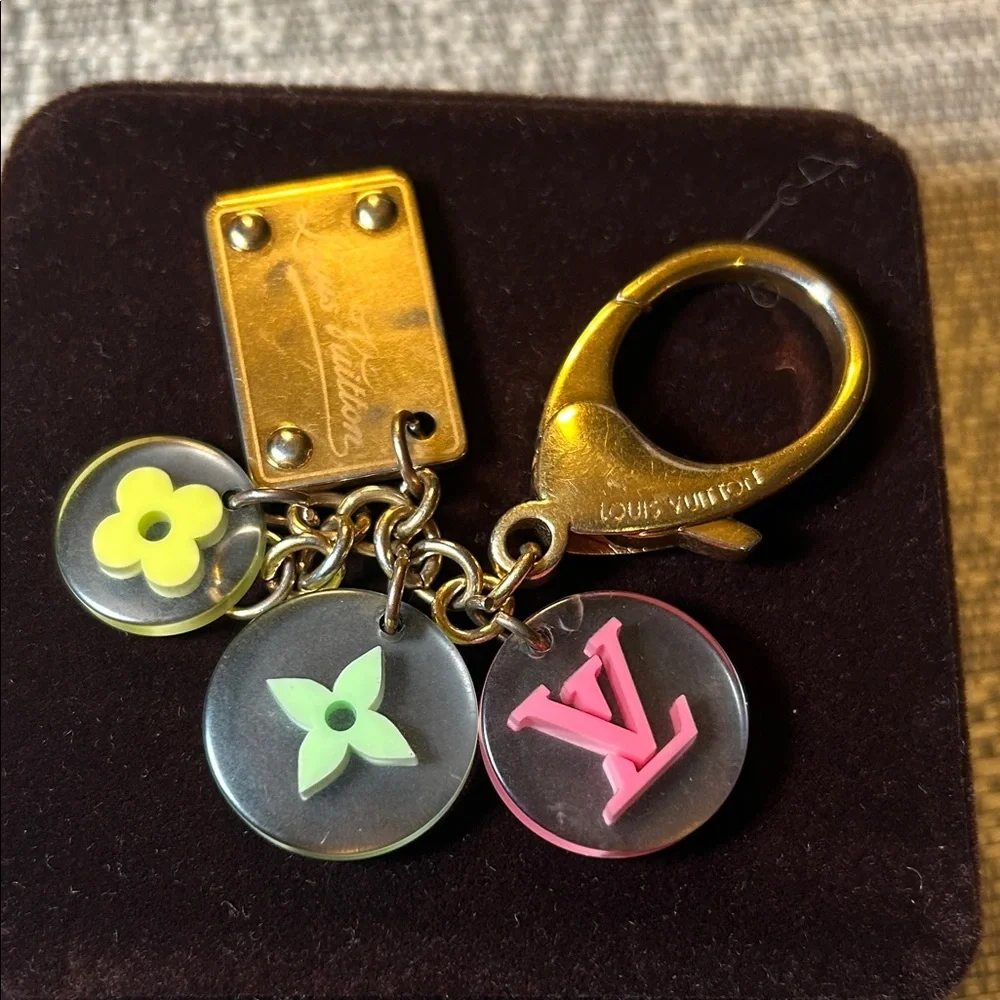138. Louis Vuitton Gold Keychain with Pink, Yellow, Green Charms with COA